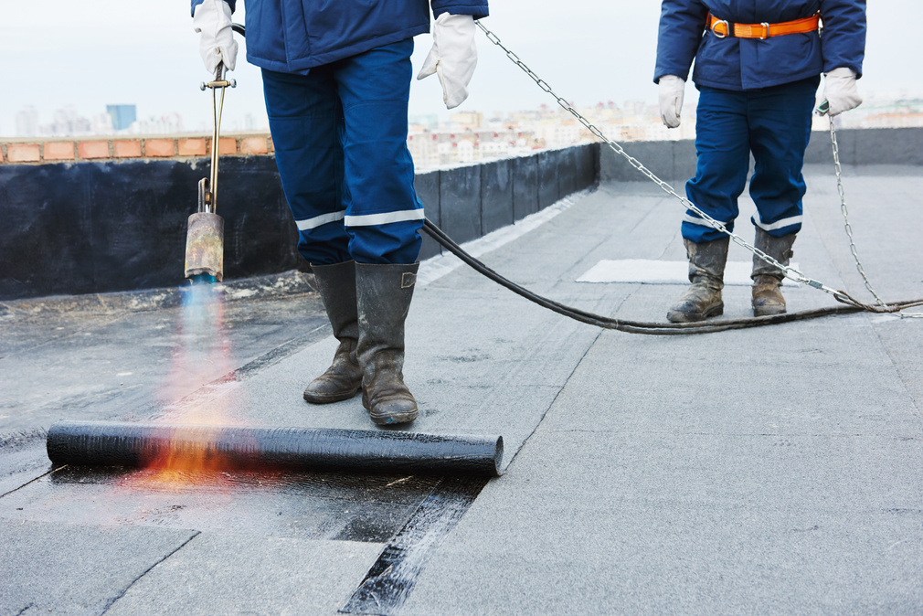 Heating and Melting Bitumen Roofing Felt